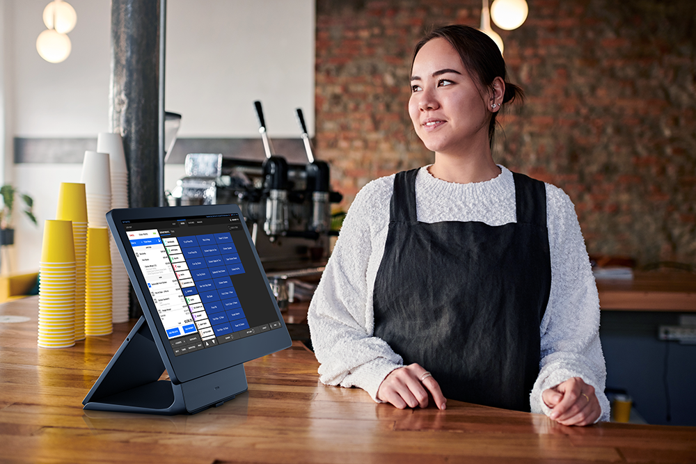 Cafe counter with a Shift4 Dine POS workstation