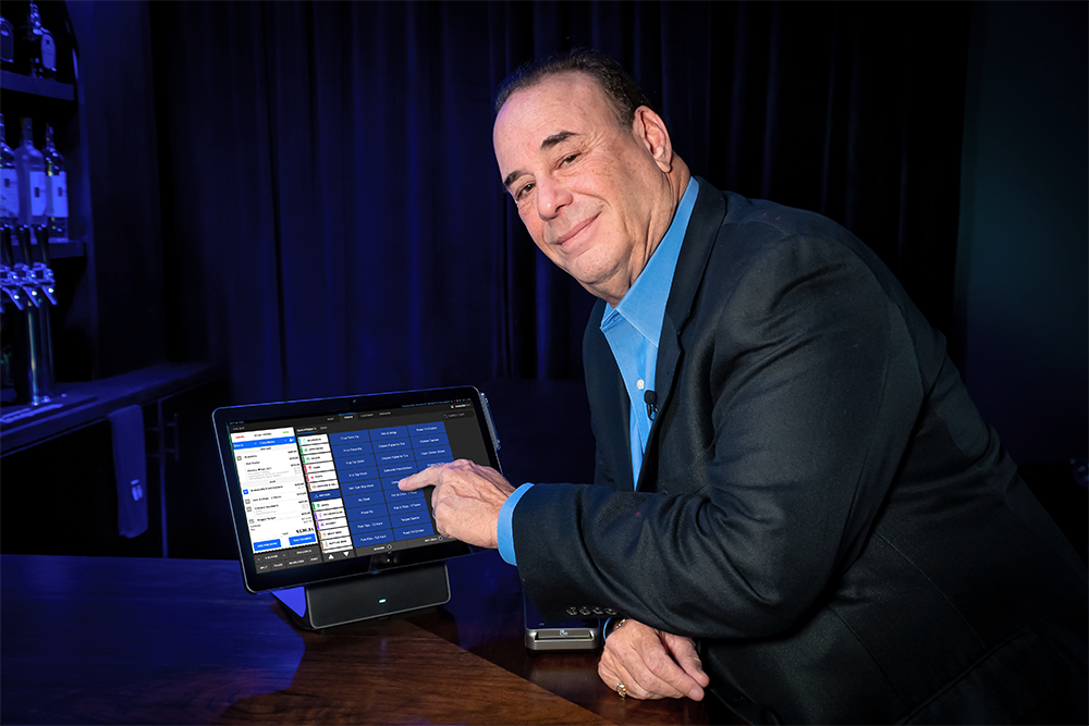 Jon Taffer with a Shift4 Dine POS