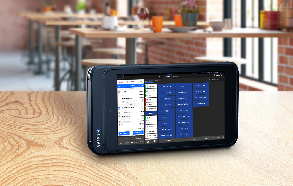 Shift4 Dine tablet POS on a restaurant table